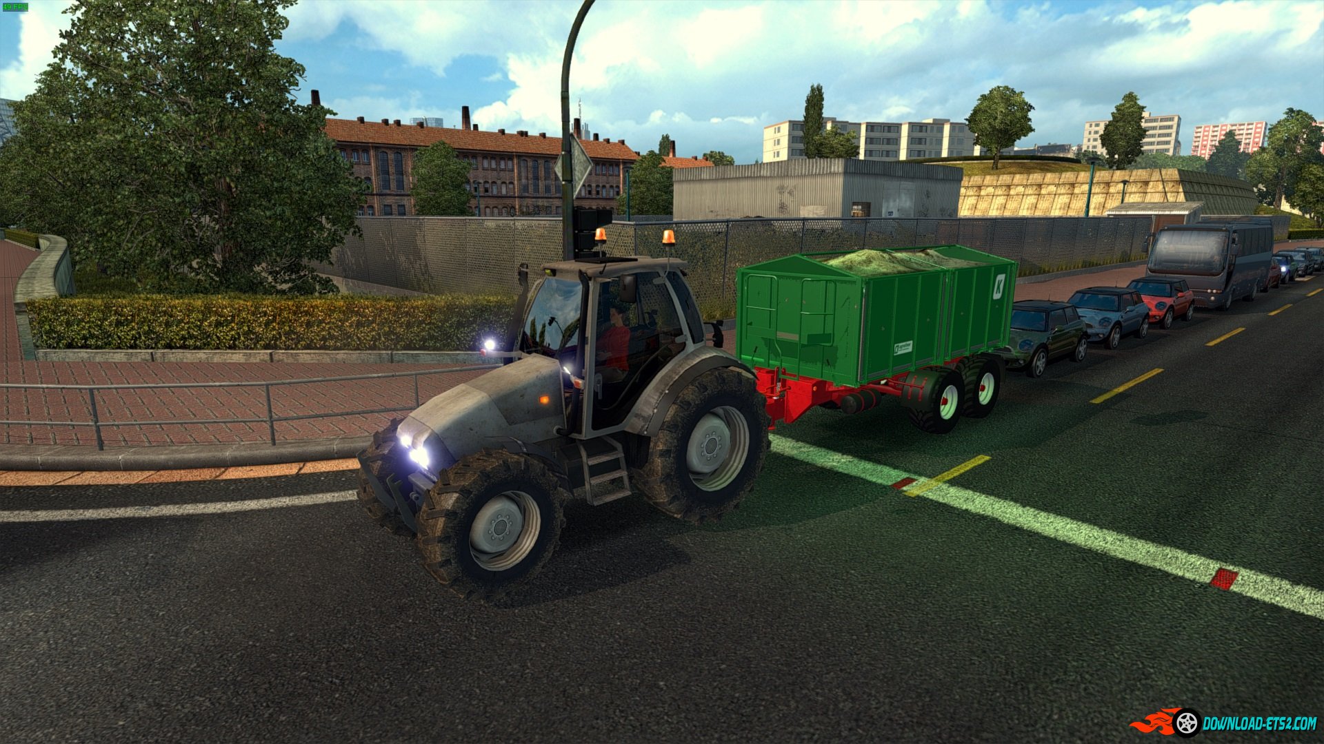 Tractor with trailer in traffic